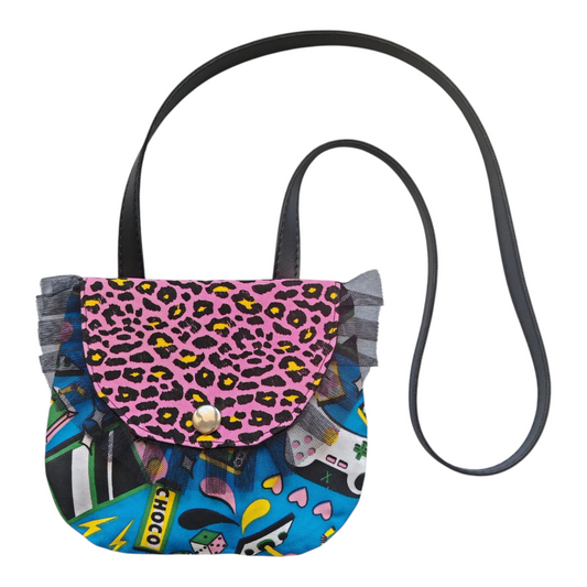 Sac bandoulière enfant motif pop art avec imprimés manettes de jeux vidéo, léopard rose et volant en tulle noir.