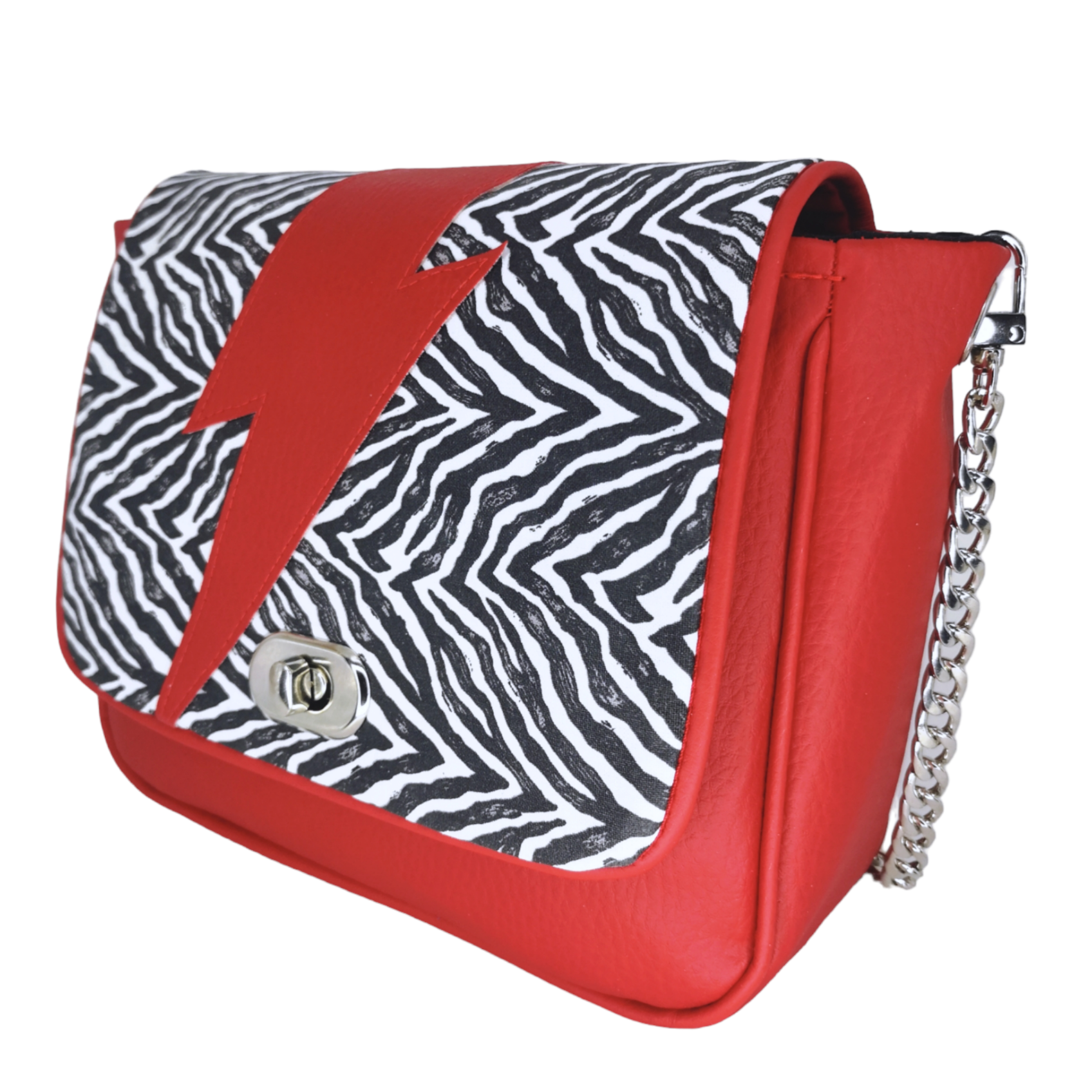 Sac à main bandoulière rock Les RoQuettes, modèle Bowie zébré noir et blanc avec éclair rouge et chaîne argentée.